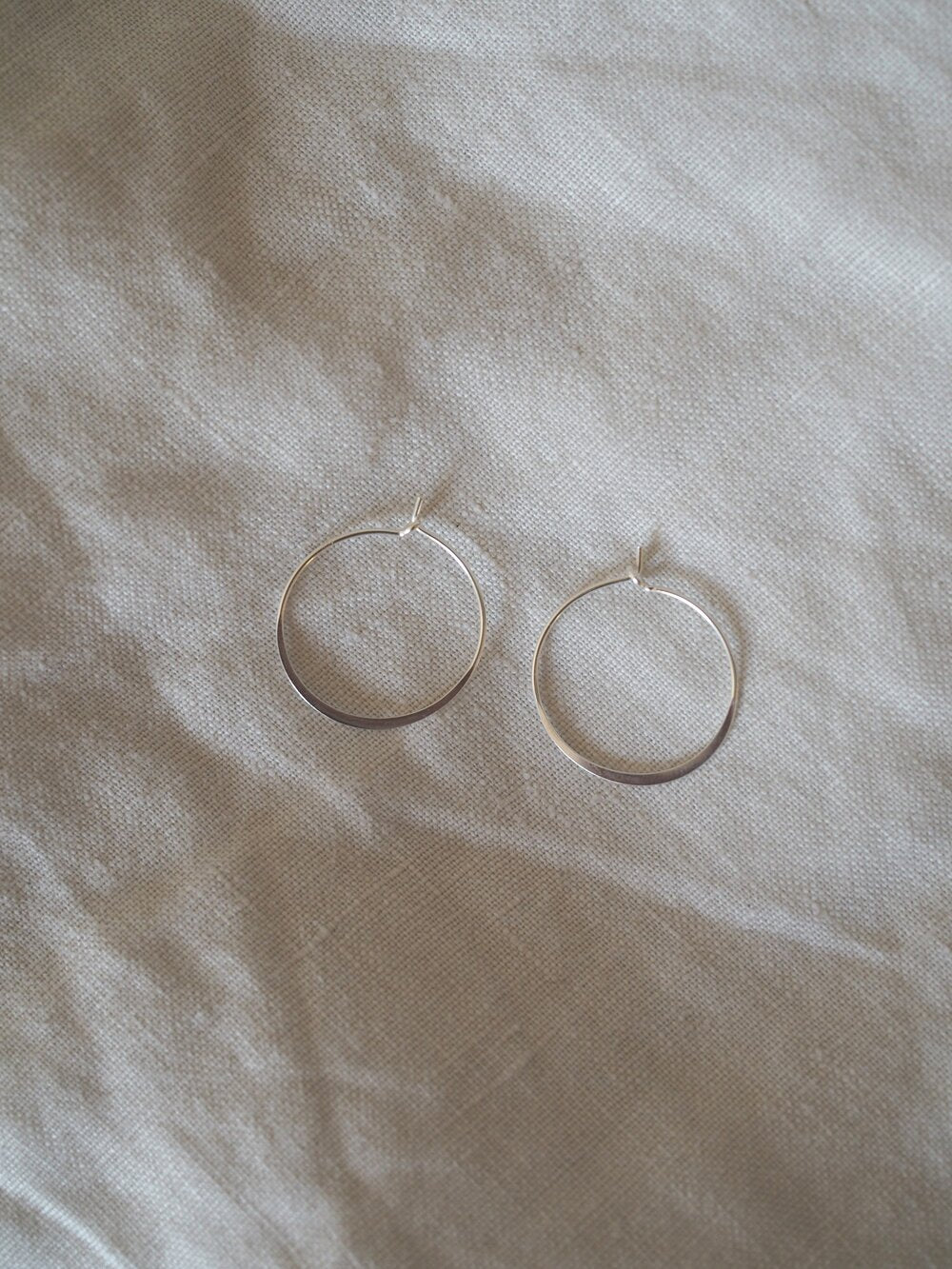 The Every Space Marianne minimal silver hoop earrings by Roake Studio
