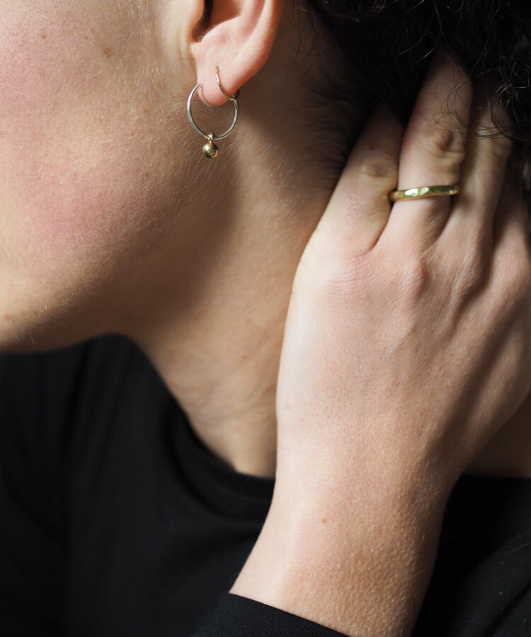 The Every Space Mini Emily earrings with sterling silver hoops and brass pendants by Roake Studio