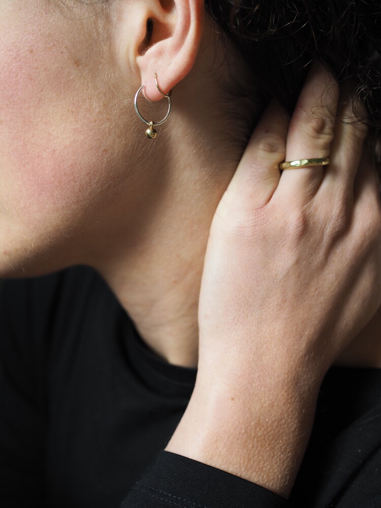 The Every Space Mini Emily earrings with sterling silver hoops and brass pendants by Roake Studio