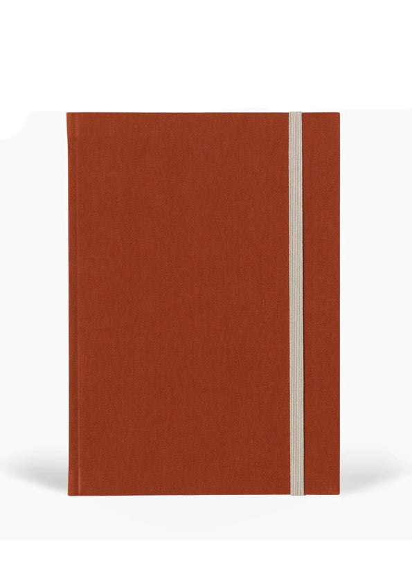 The Every Space lined medium Bea Notebook with Dark Sienna softcover cloth with elastic band by Notem