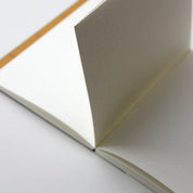 Uma Notebook | Medium in Ochre