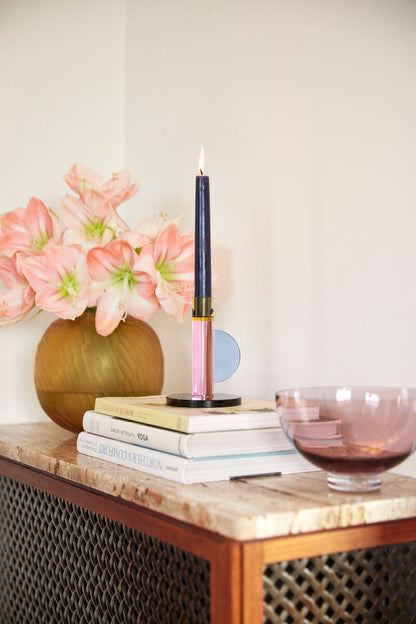 The Every Space Astro candle holder in pink, yellow, blue, and green crystal glass by Hübsch