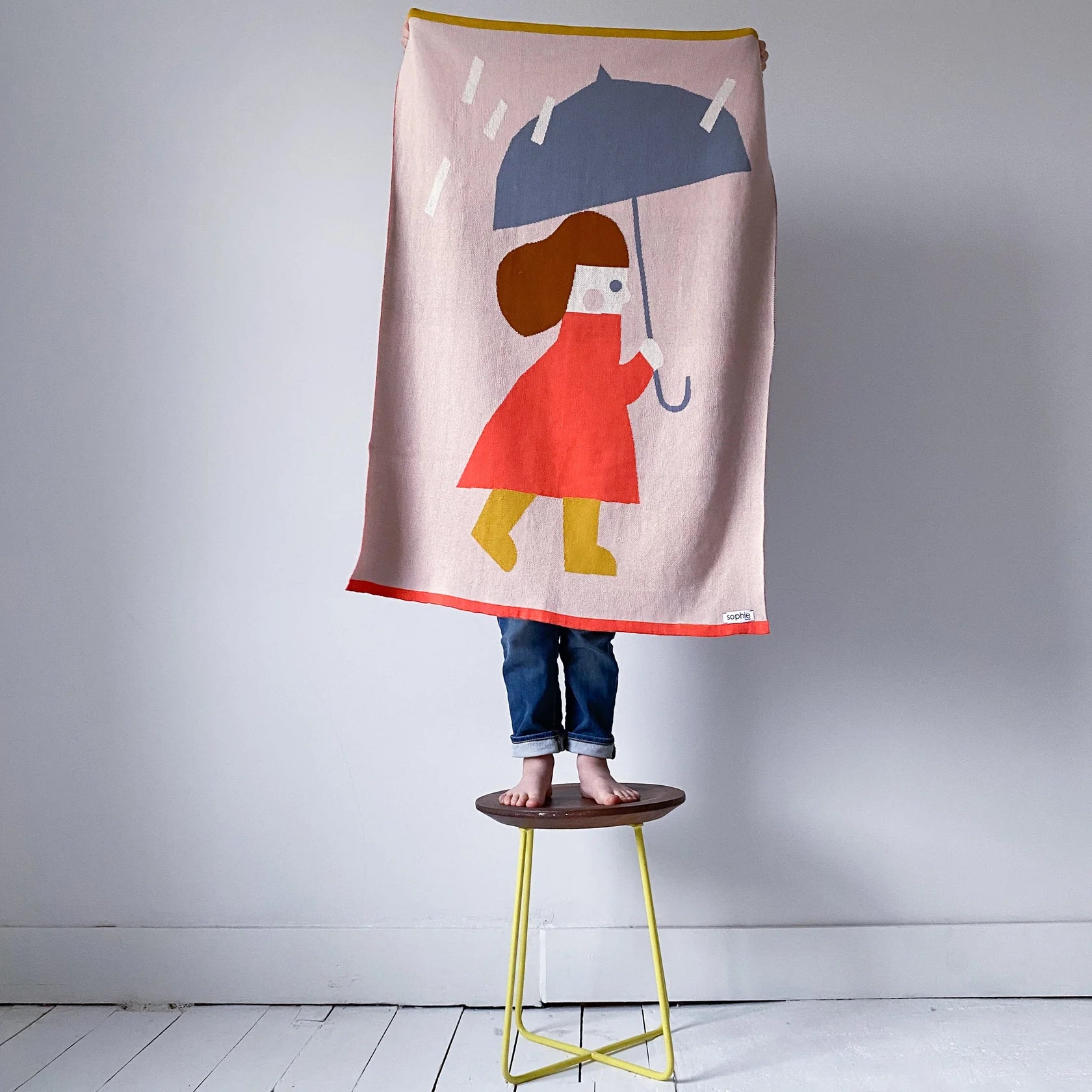 The Every Space Rainy Day Multi-colour baby blanket in 100% cotton for cot or pram by Sophie Home