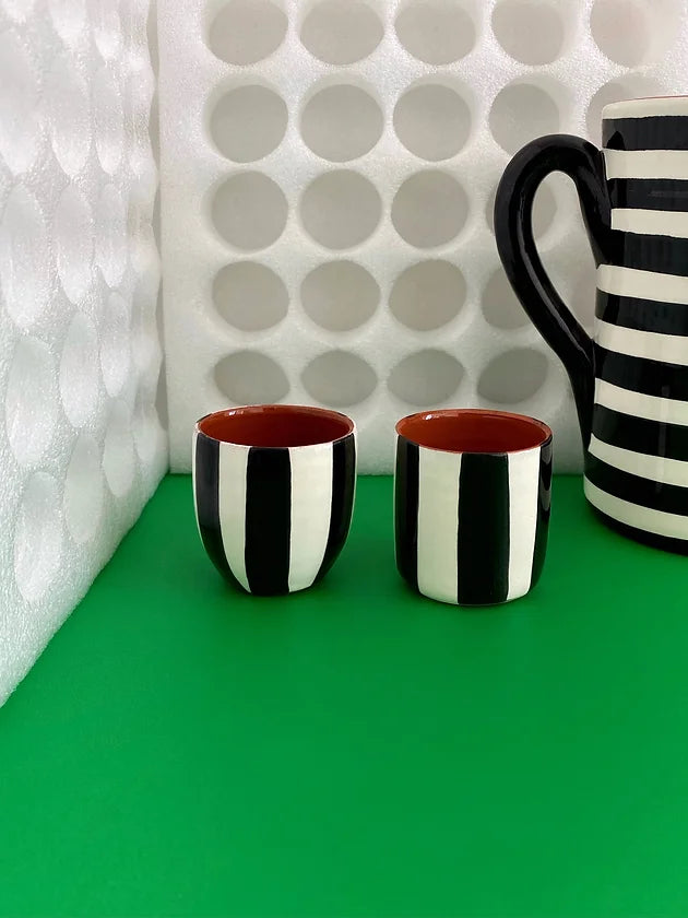 The Every Space Shot black & white vertical stripe ceramic tumbler by Casa Cubista