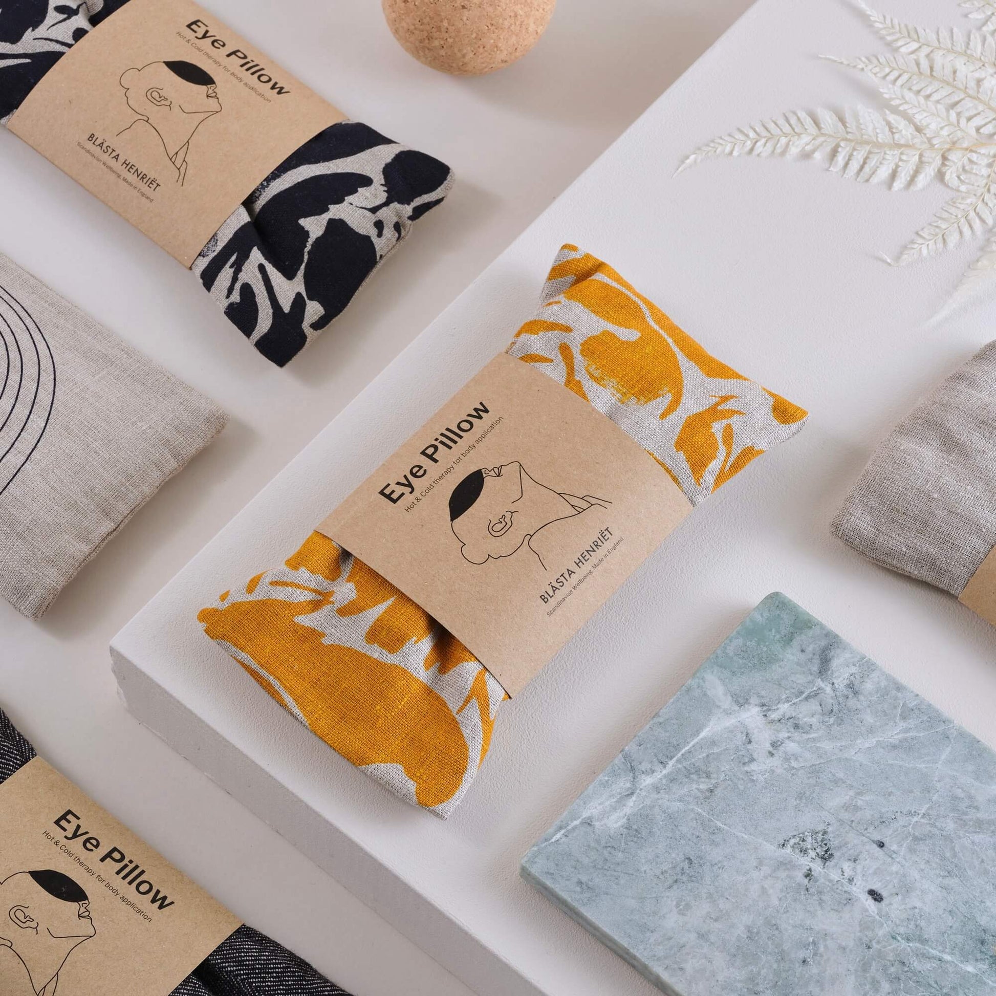 The Every Space hot and cold compress eye pillow in yellow patterned linen and filled with wheat by Blästa Henriët