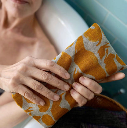 The Every Space hot and cold compress eye pillow in yellow patterned linen and filled with wheat by Blästa Henriët