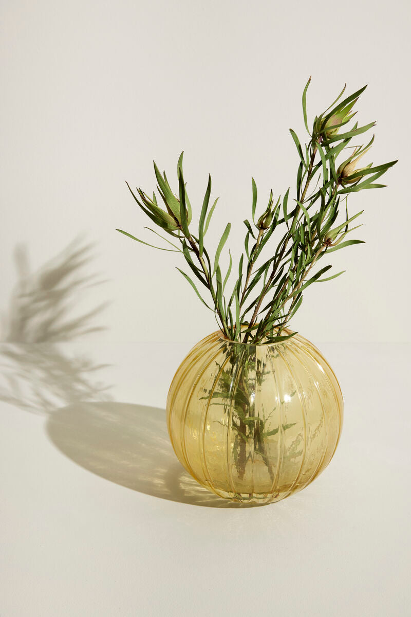 The Every Space round yellow rippled glass Fleur Vase for fresh flowers and dry flowers by Hübsch